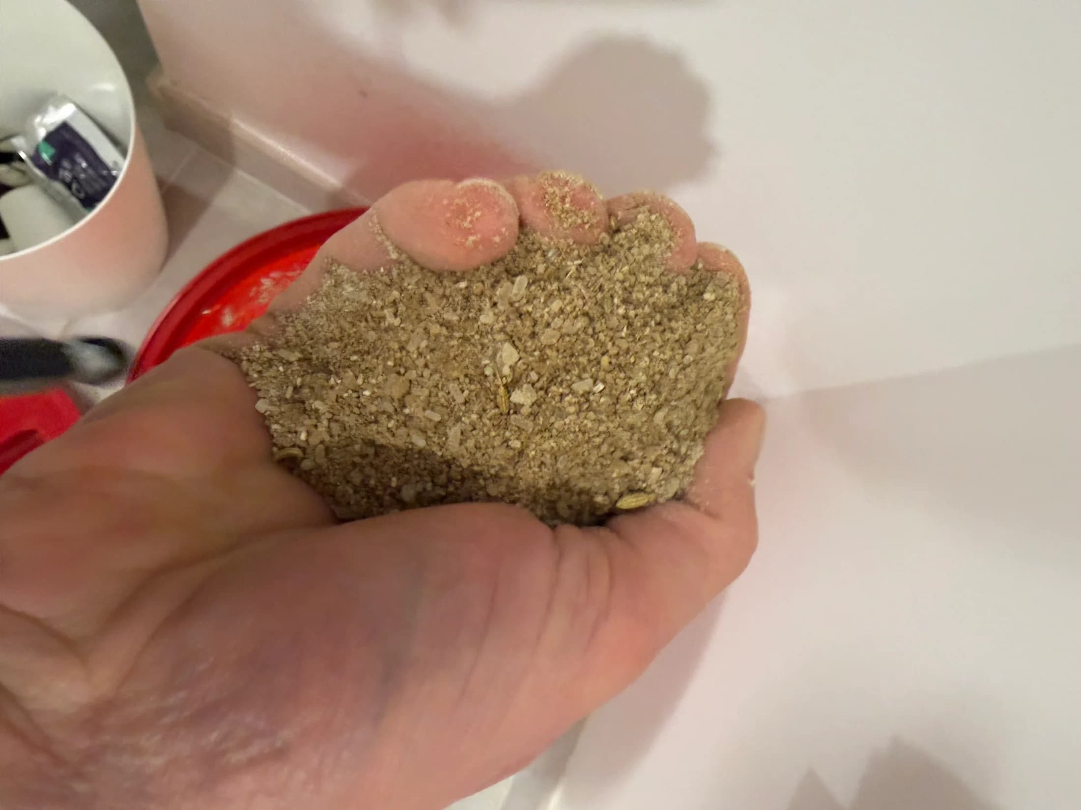 Actual beige and taupe Low Tide material held above bath water